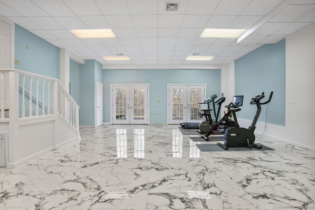 35 Grace View Dr, Easton, CT 06612 - workout room with french doors, marble tiled flooring, and a paneled ceiling