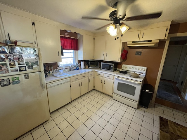 kitchen with white appliances, ceiling fan, a sink, light countertops, and under cabinet range hood