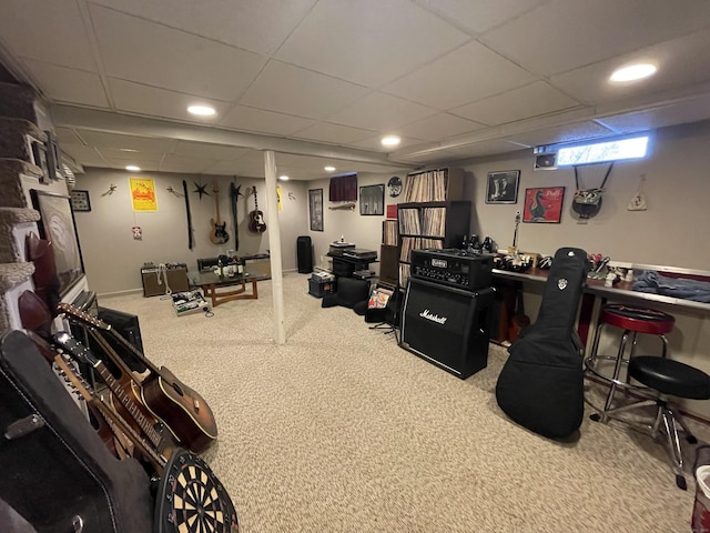 carpeted office featuring a drop ceiling, recessed lighting, and baseboards