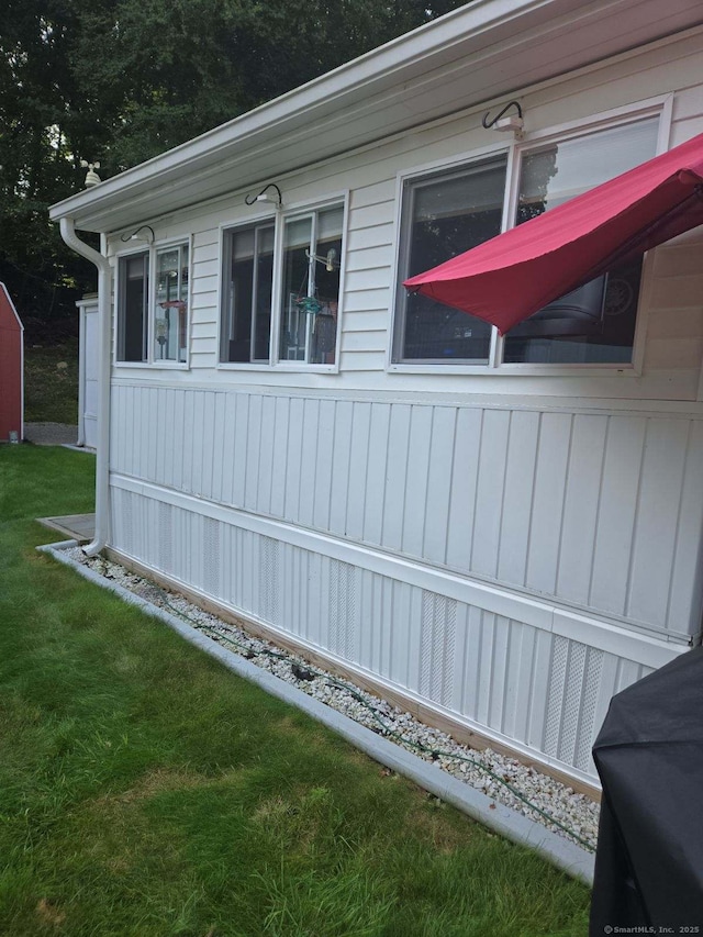 301 Buddington Rd Lot 49, Groton, CT 06340 - view of side of home with a yard