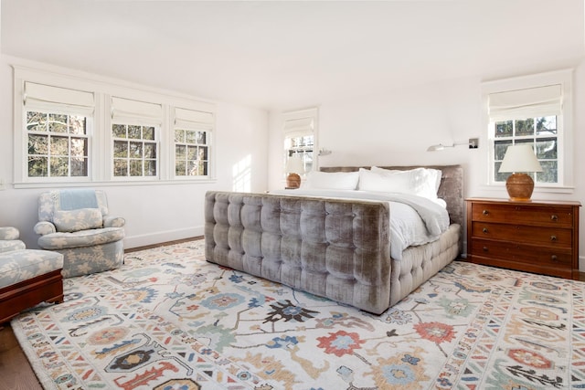 bedroom featuring baseboards