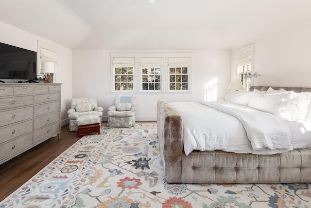 bedroom featuring dark wood-style floors