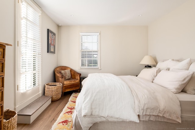 bedroom with light wood-style floors