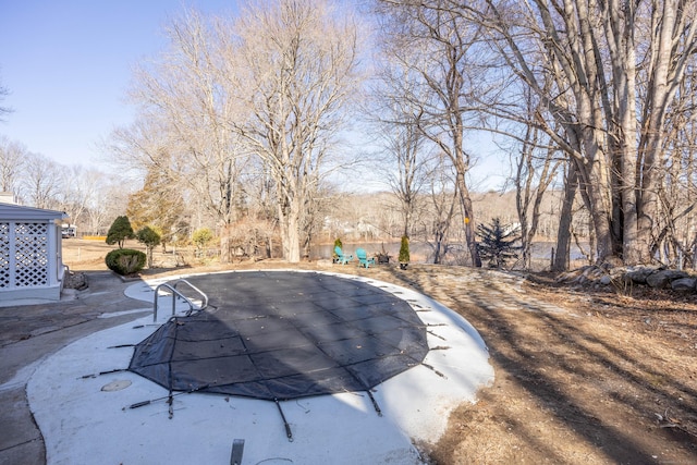 view of pool with a fenced in pool