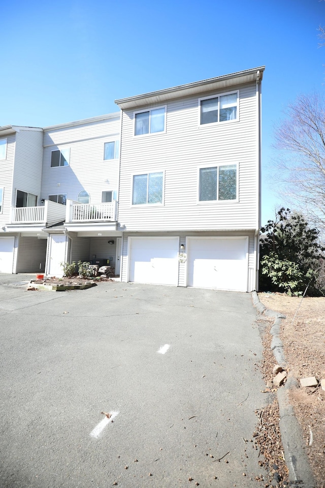 view of front of home with an attached garage and driveway