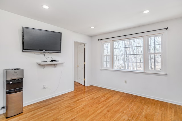 unfurnished bedroom featuring recessed lighting, baseboards, and light wood finished floors