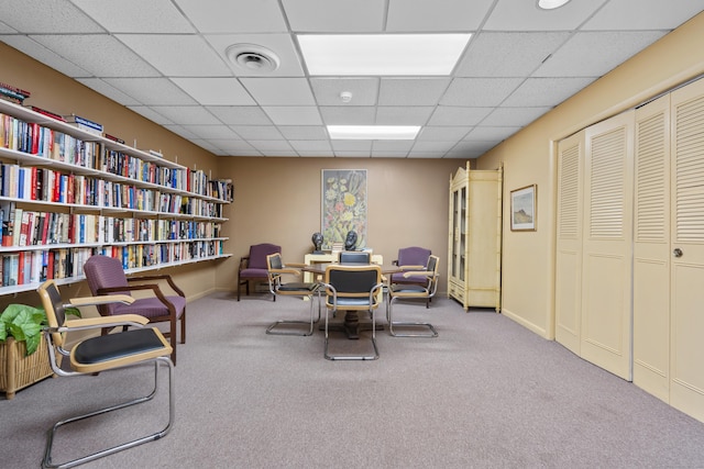 sitting room featuring a paneled ceiling, visible vents, carpet floors, and baseboards