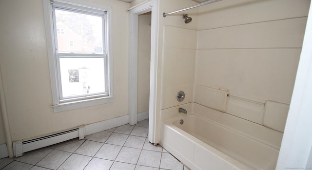 bathroom with tile patterned floors, a baseboard heating unit, plenty of natural light, and  shower combination