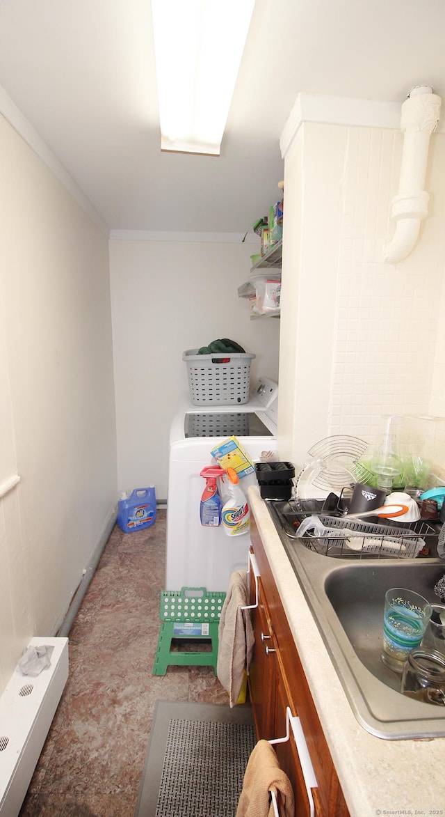 washroom with laundry area and crown molding