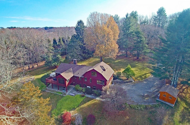 bird's eye view featuring a view of trees