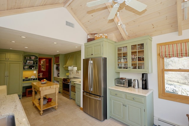 kitchen featuring green cabinetry, a baseboard radiator, appliances with stainless steel finishes, and custom range hood