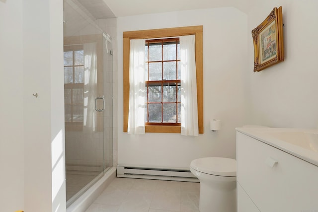 full bath with vanity, toilet, a stall shower, and a baseboard radiator