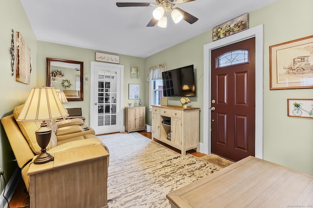 foyer with ceiling fan