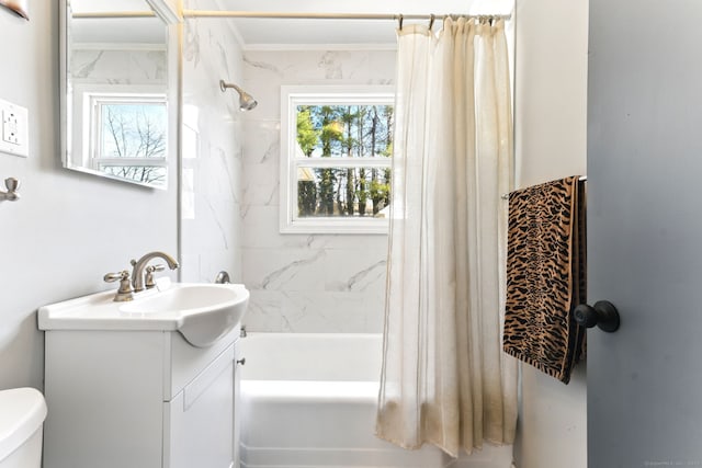 full bathroom featuring shower / bath combination with curtain, toilet, and vanity