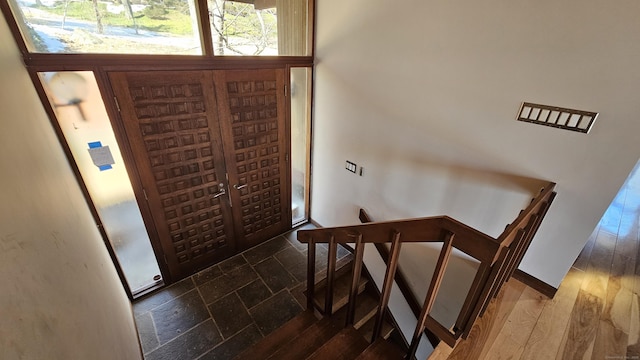 entrance foyer featuring wood finished floors