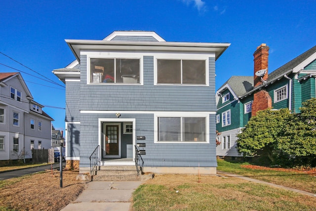 view of front facade featuring a front yard