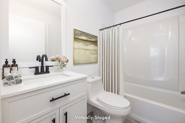 full bath featuring toilet, shower / bath combo, and vanity