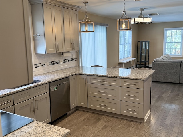 kitchen featuring light wood-type flooring, a peninsula, gray cabinets, dishwasher, and tasteful backsplash