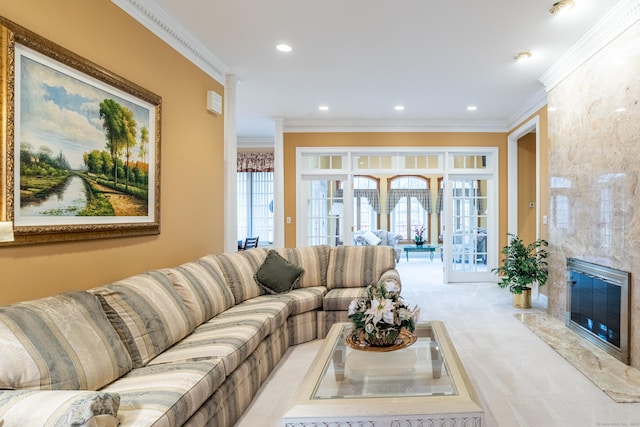 carpeted living room featuring recessed lighting, french doors, a wealth of natural light, and ornamental molding