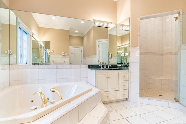 full bath with crown molding, a whirlpool tub, a stall shower, tile patterned floors, and vanity