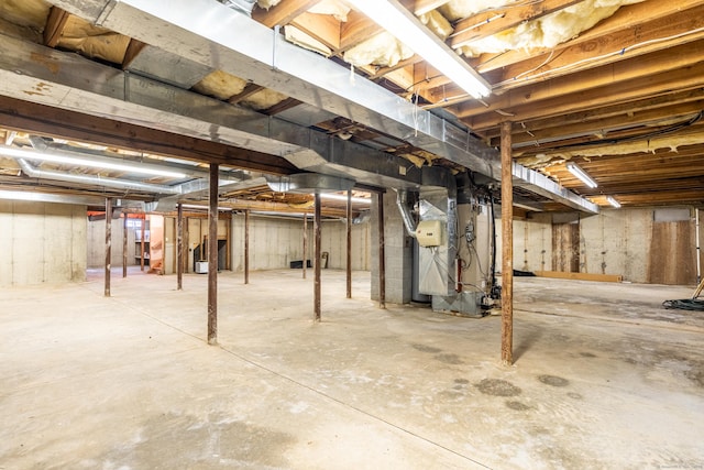 unfinished basement with heating unit