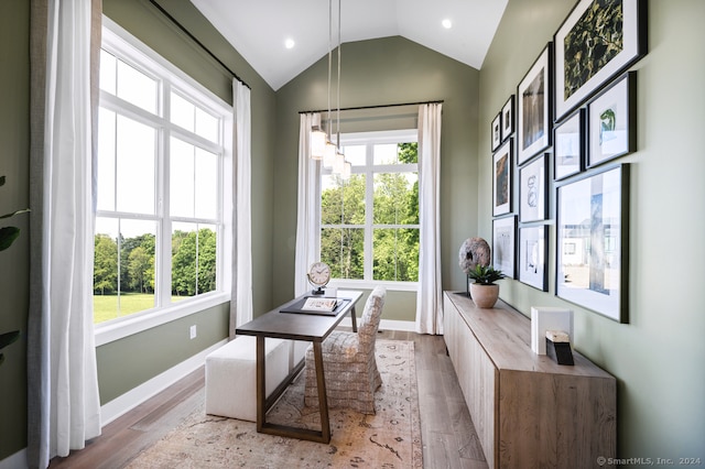 office area with vaulted ceiling, recessed lighting, wood finished floors, and baseboards