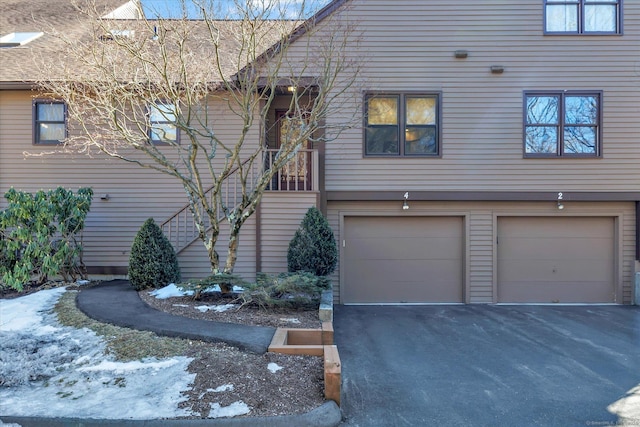 view of front of property with an attached garage and driveway