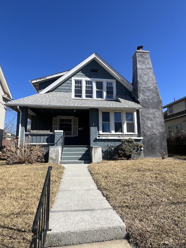 112 Concord St, Waterbury, CT 06710 - bungalow-style home featuring a chimney, a porch, and a shingled roof