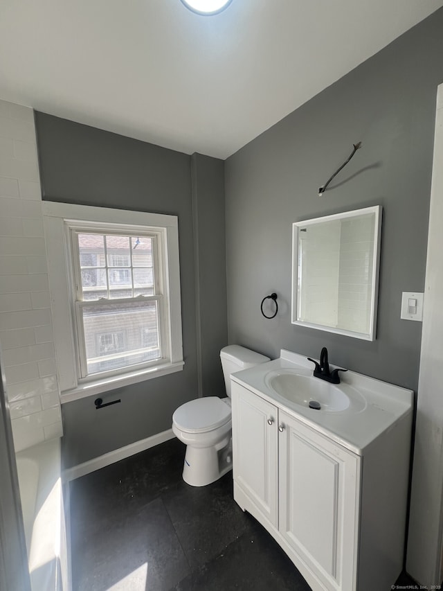 112 Concord St, Waterbury, CT 06710 - bathroom with baseboards, toilet, and vanity