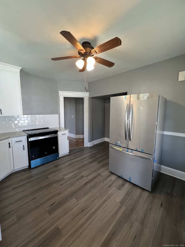 112 Concord St, Waterbury, CT 06710 - kitchen with white cabinetry, electric range oven, a ceiling fan, and freestanding refrigerator