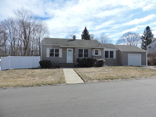 single story home featuring a garage, a chimney, a front yard, and fence