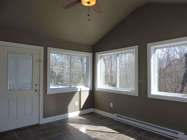 unfurnished sunroom with a baseboard heating unit, plenty of natural light, and lofted ceiling