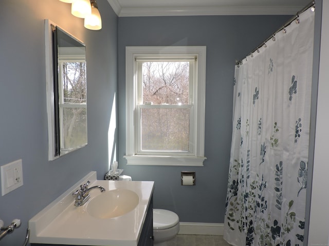 full bath featuring tile patterned flooring, crown molding, baseboards, toilet, and vanity