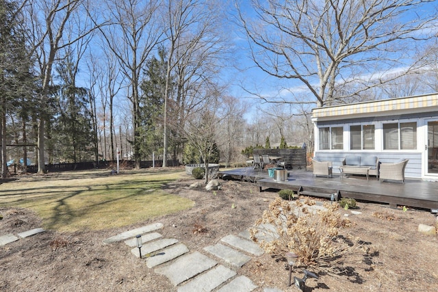 view of yard with a wooden deck