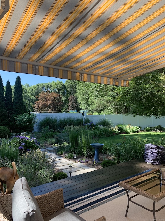 view of patio / terrace featuring fence