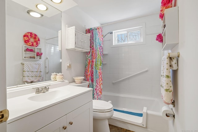 bathroom with vanity, toilet, and shower / bathtub combination with curtain