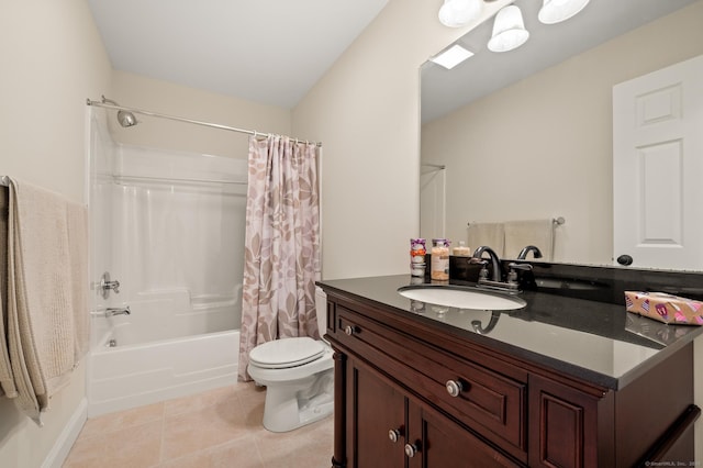 bathroom with tile patterned floors, toilet, shower / bath combo, and vanity