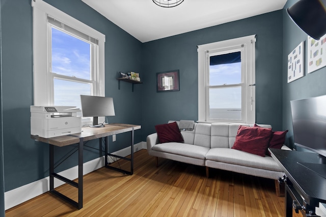office area with light wood-style floors