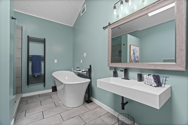 full bath featuring a soaking tub, visible vents, baseboards, wooden ceiling, and vaulted ceiling