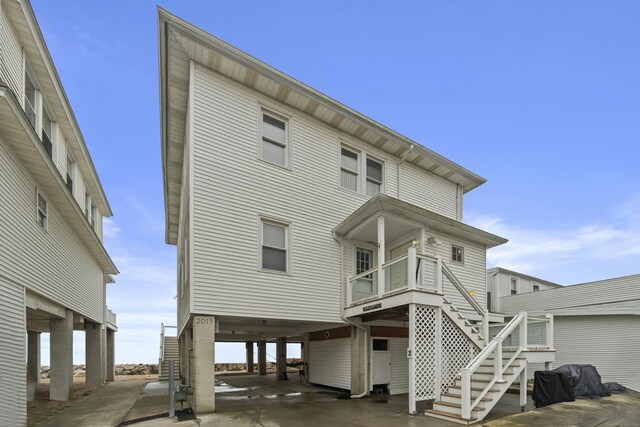 2 Jamaica Ct, East Haven, CT 06512 - view of front of house featuring stairs and a carport