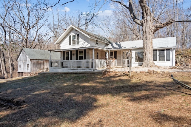 back of house with covered porch