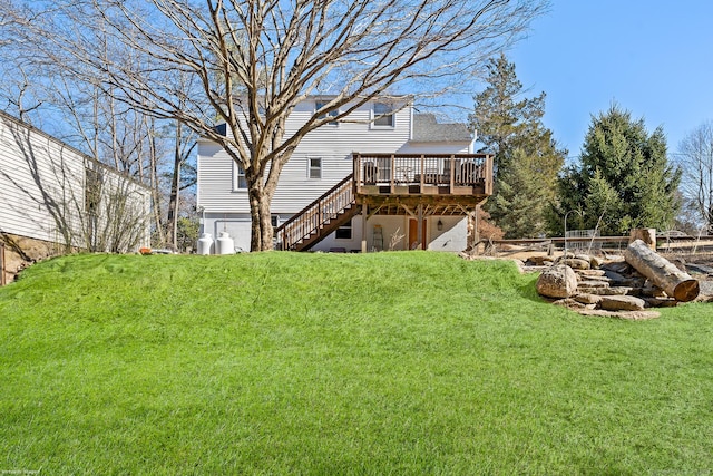 view of yard featuring a wooden deck and stairs