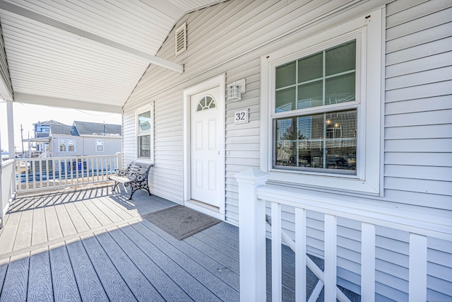 deck with covered porch