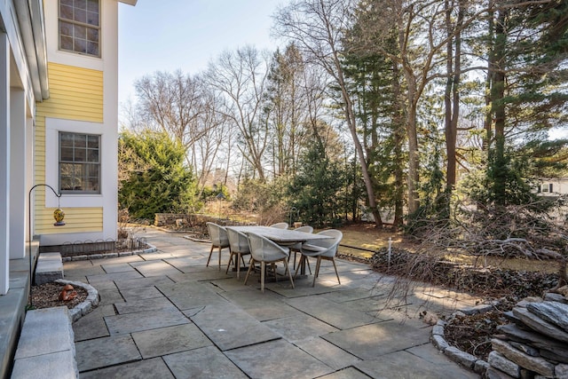 view of patio featuring outdoor dining area