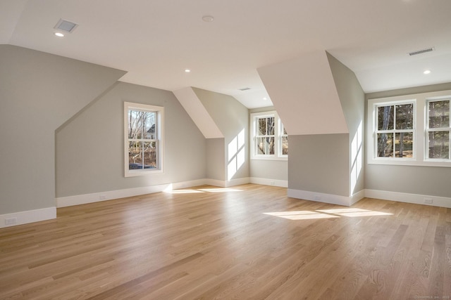 412 Tanner Marsh Rd, Guilford, CT 06437 - additional living space featuring lofted ceiling, healthy amount of natural light, light wood-style flooring, baseboards, and recessed lighting