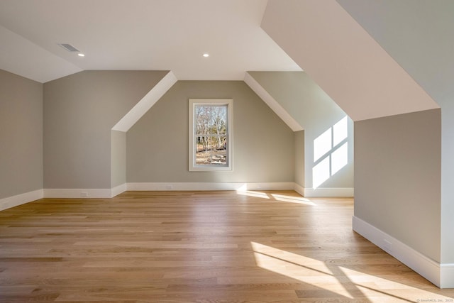 412 Tanner Marsh Rd, Guilford, CT 06437 - additional living space with vaulted ceiling, light wood finished floors, recessed lighting, and baseboards