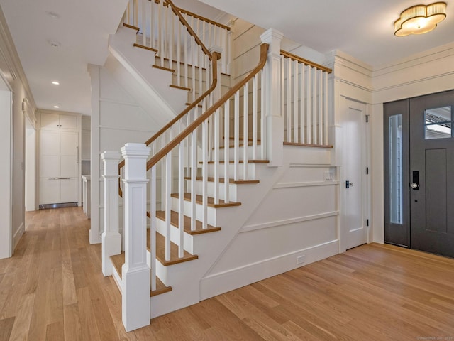 412 Tanner Marsh Rd, Guilford, CT 06437 - entryway featuring wood finished floors, stairway, and recessed lighting
