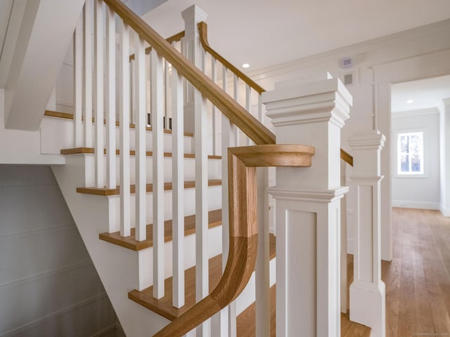 412 Tanner Marsh Rd, Guilford, CT 06437 - staircase featuring wood finished floors, recessed lighting, and ornamental molding