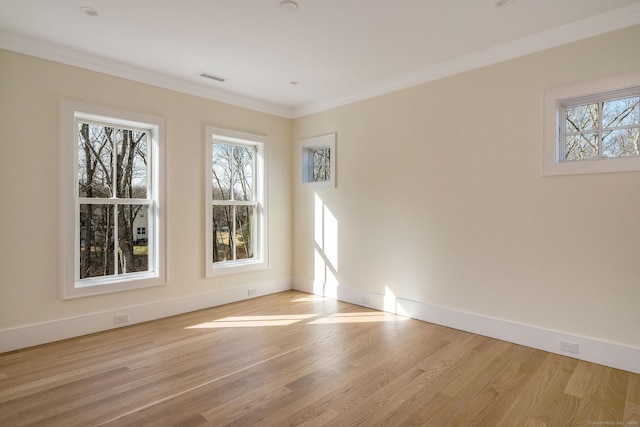 412 Tanner Marsh Rd, Guilford, CT 06437 - empty room featuring light wood-style flooring, ornamental molding, and baseboards