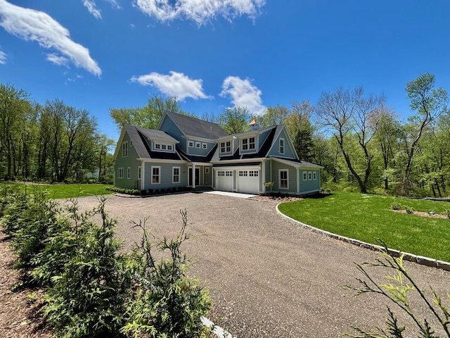 412 Tanner Marsh Rd, Guilford, CT 06437 - shingle-style home featuring driveway, an attached garage, a chimney, and a front yard